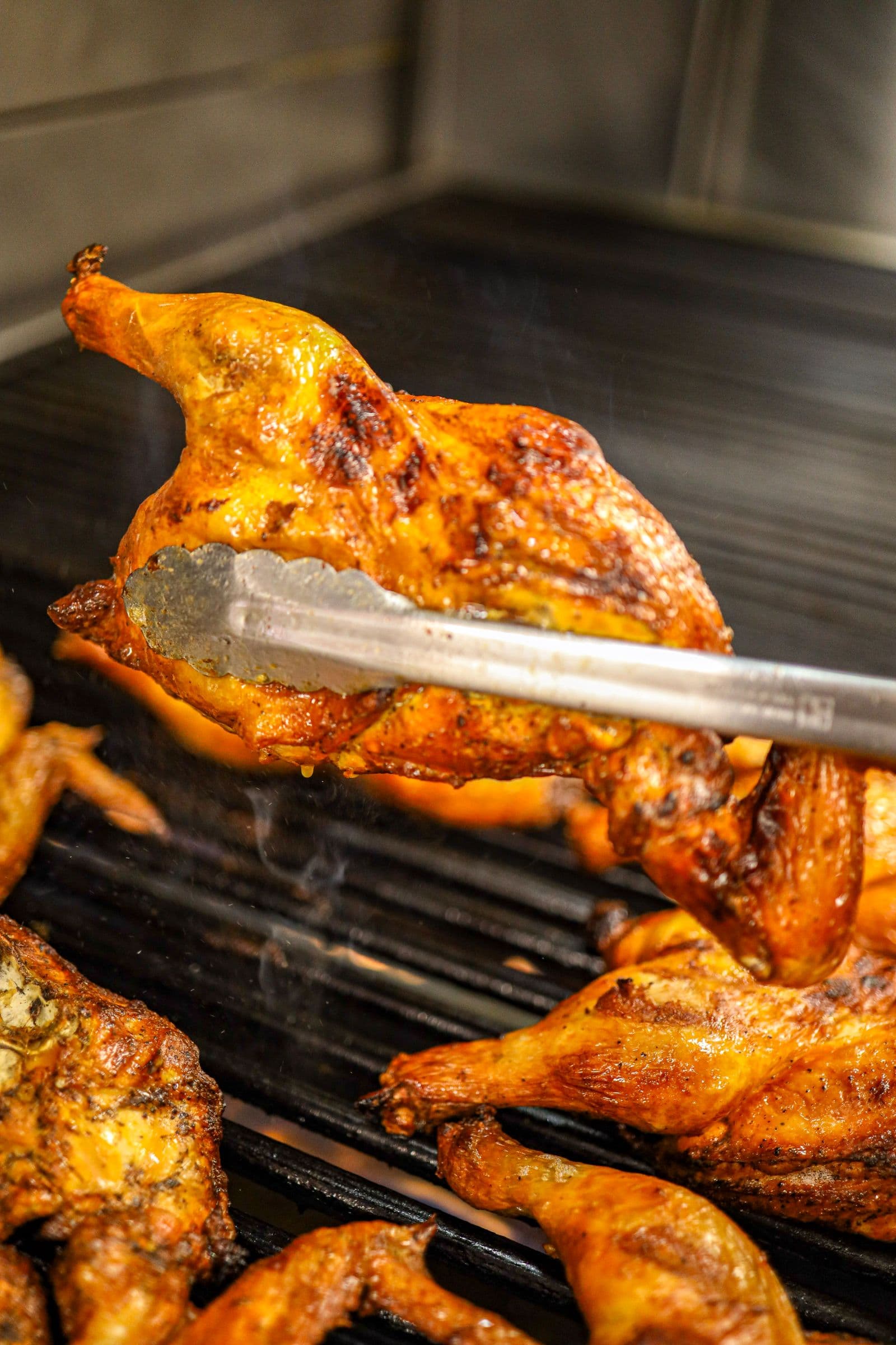 Whole chickens on the Pollo Pepe grill
